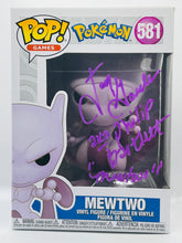 Load image into Gallery viewer, Mewtwo 581 Pokemon Funko Pop Signed by Jay Goede / aka Philip Bartlett in purple paint pen with character name
